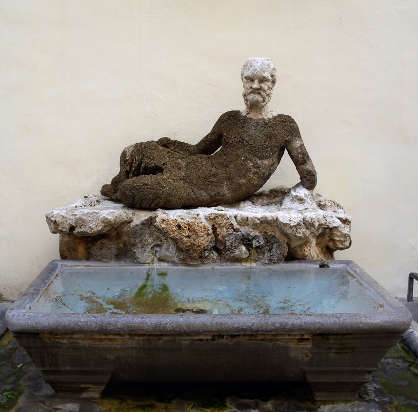 The Babuino fountain: a reclining Silenus above an ancient basin on Via del Babuino