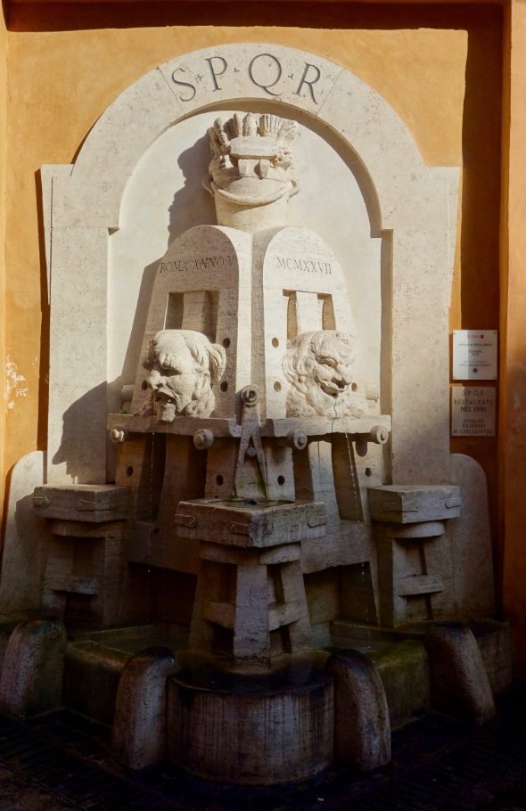The Fontana degli Artisti on Via Margutta, with its easels, brushes and two masks